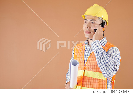 Construction Engineer Talking on Phone Construction Engineer Talking on Phone 84438643