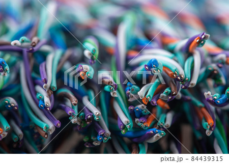 Cut scrap of copper electric cable wire closeup Cut scrap of copper electric cable wire closeup 84439315