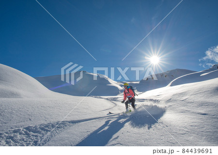 A skier with a learning technique off-piste 84439691