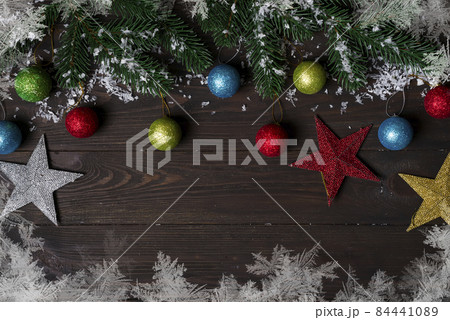 Christmas wooden background with snow fir tree. 84441089