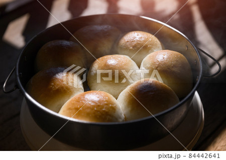 Home made baked round white breads. Home made baked round white breads. 84442641