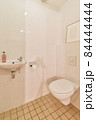 Interior of small clean restroom in miniature style 84444444