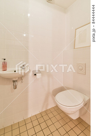 Interior of small clean restroom in miniature style 84444444