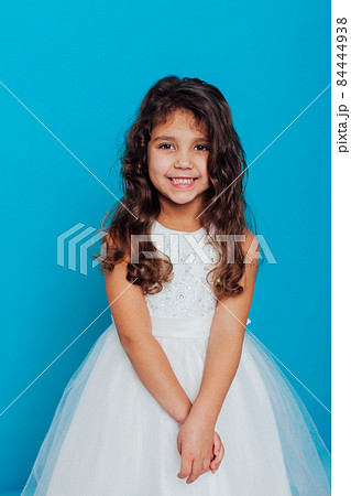 beautiful little girl in white dress as princess queen 84444938