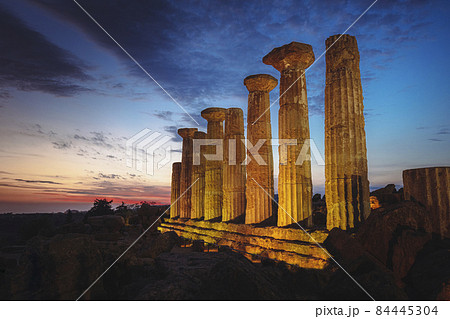 Agrigento temple heracles at sunset. 84445304