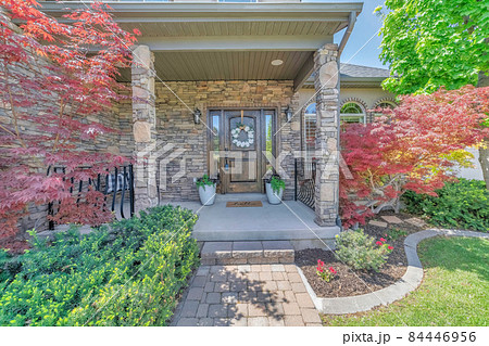 House exterior with a beautiful front garden entrance House exterior with a beautiful front garden entrance 84446956