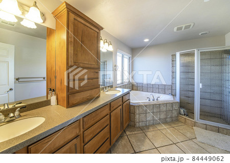 Bathroom interior with tiles and double vanity sink 84449062