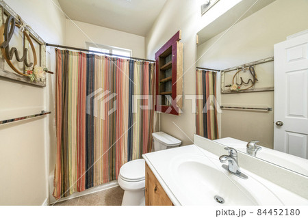 Bathroom with hand crafted wood display and shelves Bathroom with hand crafted wood display and shelves 84452180