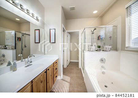Interior of a bathroom with craftsman's style vanity 84452181
