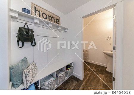 Mudroom interior with a view of a sink on the other room Mudroom interior with a view of a sink on the other room 84454018