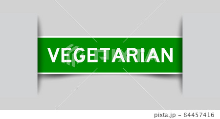 Inserted green color label sticker with word vegetarian on gray background Inserted green color label sticker with word vegetarian on gray background 84457416