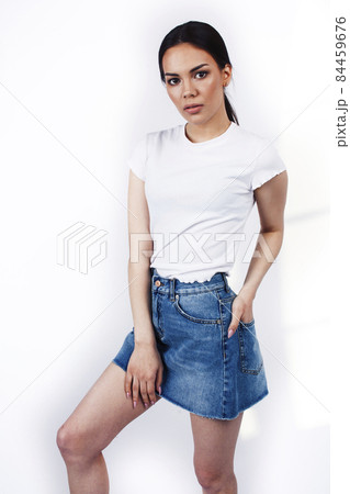 young happy smiling latin american teenage girl emotional posing isolated on white background, lifestyle people concept young happy smiling latin american teenage girl emotional posing isolated on white background, lifestyle people concept 84459676