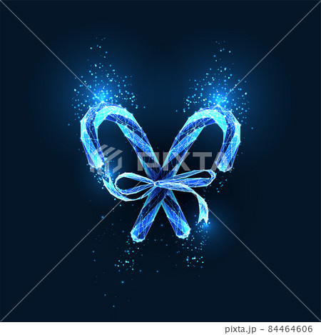 Two abstract glowing candy canes and ribbon bow and text isolated on dark blue Two abstract glowing candy canes and ribbon bow and text isolated on dark blue 84464606