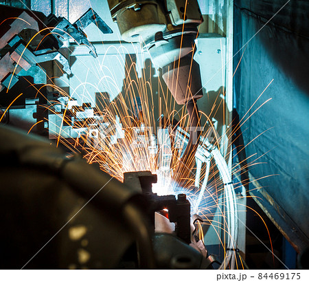 Welding robots movement in a car factory 84469175