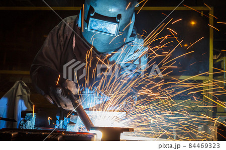 Industrial steel welder in factory 84469323
