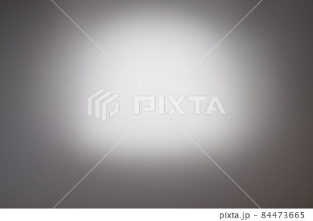 light spot on a gray or gray background 84473665