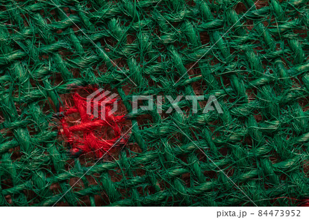 Highly detailed photo of green fabric, closeup material texture background. 84473952