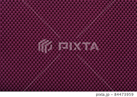 purple fabric with abstract pattern. red fiber texture polyester close-up 84473959