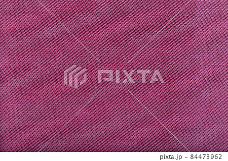 close-up of pink fabric surface, small stitches as background close-up of pink fabric surface, small stitches as background 84473962