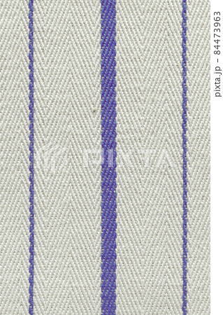 Blue fabric striped texture. Rustic canvas pattern. Colored striped coarse linen fabric closeup as background. Blue fabric striped texture. Rustic canvas pattern. Colored striped coarse linen fabric closeup as background. 84473963