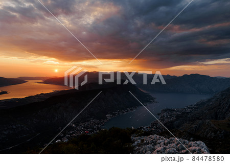View from Mount Lovcen to the orange sunset sky over the bay. Montenegro 84478580