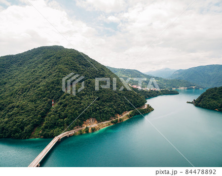 Bridge and road along Lake Piva. Montenegro. Drone 84478892