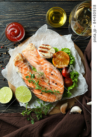 Concept of tasty eating with grilled salmon, top view Concept of tasty eating with grilled salmon, top view 84480938