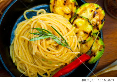 italian spaghetti pasta with zucchini sauce on iron skillet italian spaghetti pasta with zucchini sauce on iron skillet 84483074