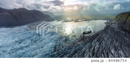 Spectacular glacier tonge end top wide panoramic view Spectacular glacier tonge end top wide panoramic view 84486754