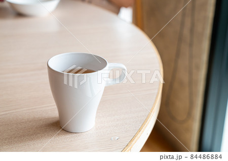 hot tea cup on table hot tea cup on table 84486884