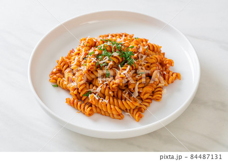 spirali or spiral pasta with tomato sauce spirali or spiral pasta with tomato sauce 84487131