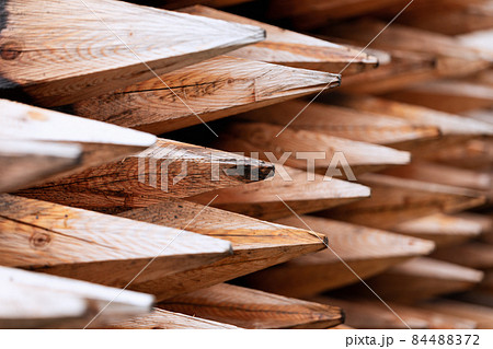 Freshly chopped wooden stakes (Selective focus) Freshly chopped wooden stakes (Selective focus) 84488372