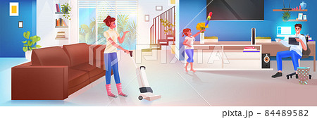 parents with children cleaning living room parenting friendly family concept full length 84489582