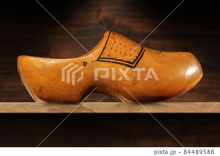 Wooden Clog made in Netherlands on a Wood Shelf Wooden Clog made in Netherlands on a Wood Shelf 84489586