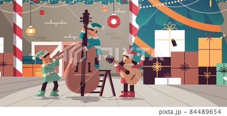 elves with musical instruments santa helpers team playing guitar and trumpet happy new year christmas holidays celebration elves with musical instruments santa helpers team playing guitar and trumpet happy new year christmas holidays celebration 84489654