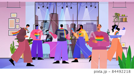 businesspeople working together in office lgbt rainbow flags gay lesbian transgender love concept businesspeople working together in office lgbt rainbow flags gay lesbian transgender love concept 84492218