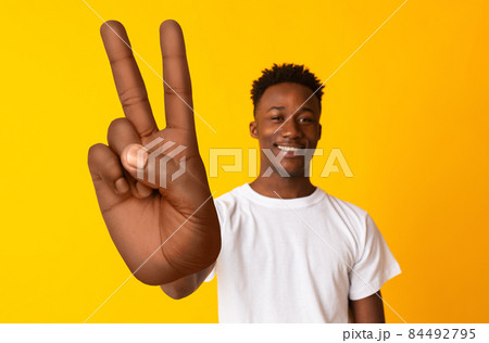 Young African American Guy Smiling At Camera の写真素材