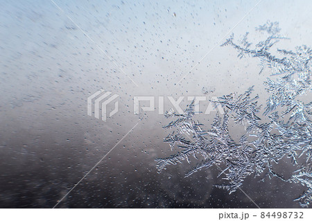 snow pattern on the glass from frost snow pattern on the glass from frost 84498732