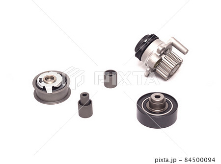 Set of rollers of the automobile engine timing system and the cooling pump on a white background, motor cars Set of rollers of the automobile engine timing system and the cooling pump on a white background, motor cars 84500094