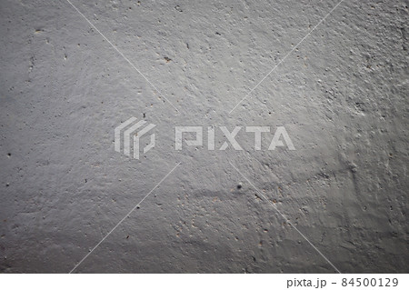 Grey painted concrete texture with brush for interesting and modern backgrounds. Suitable for web design and wallpapers 84500129