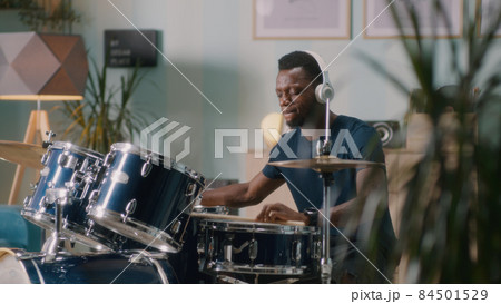Black drummer playing energetic song Black drummer playing energetic song 84501529