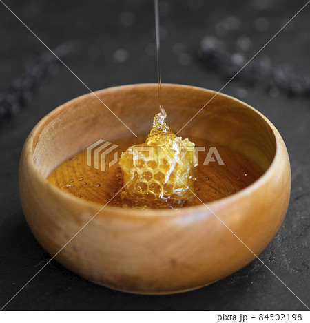 delicious honeycomb wooden bowl. High quality photo delicious honeycomb wooden bowl. High quality photo 84502198