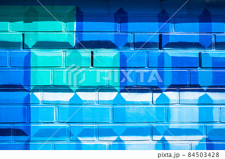 colorful pattern on a brick wall. background 84503428
