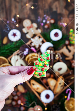 Sweet Christmas cookies in wooden box on rustic table Sweet Christmas cookies in wooden box on rustic table 84504582