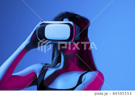 Woman with glasses of virtual reality. Future technology concept. 84505553