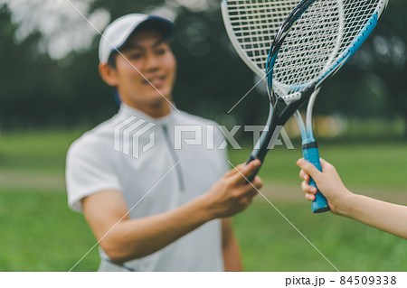 テニスのラケットタッチの写真素材
