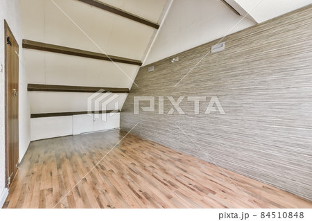 Mind-blowing attic room with sleek wood parquet flooring Mind-blowing attic room with sleek wood parquet flooring 84510848