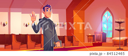 Catholic priest with Bible in church interior 84512465