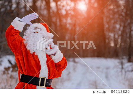 Authentic in the forest Santa Claus in carrying Merry Christmas present Authentic in the forest Santa Claus in carrying Merry Christmas present 84512826