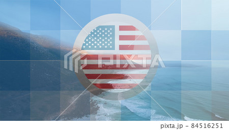 Image of american flag in circle and blue square grid over ocean coastline and blue sky 84516251